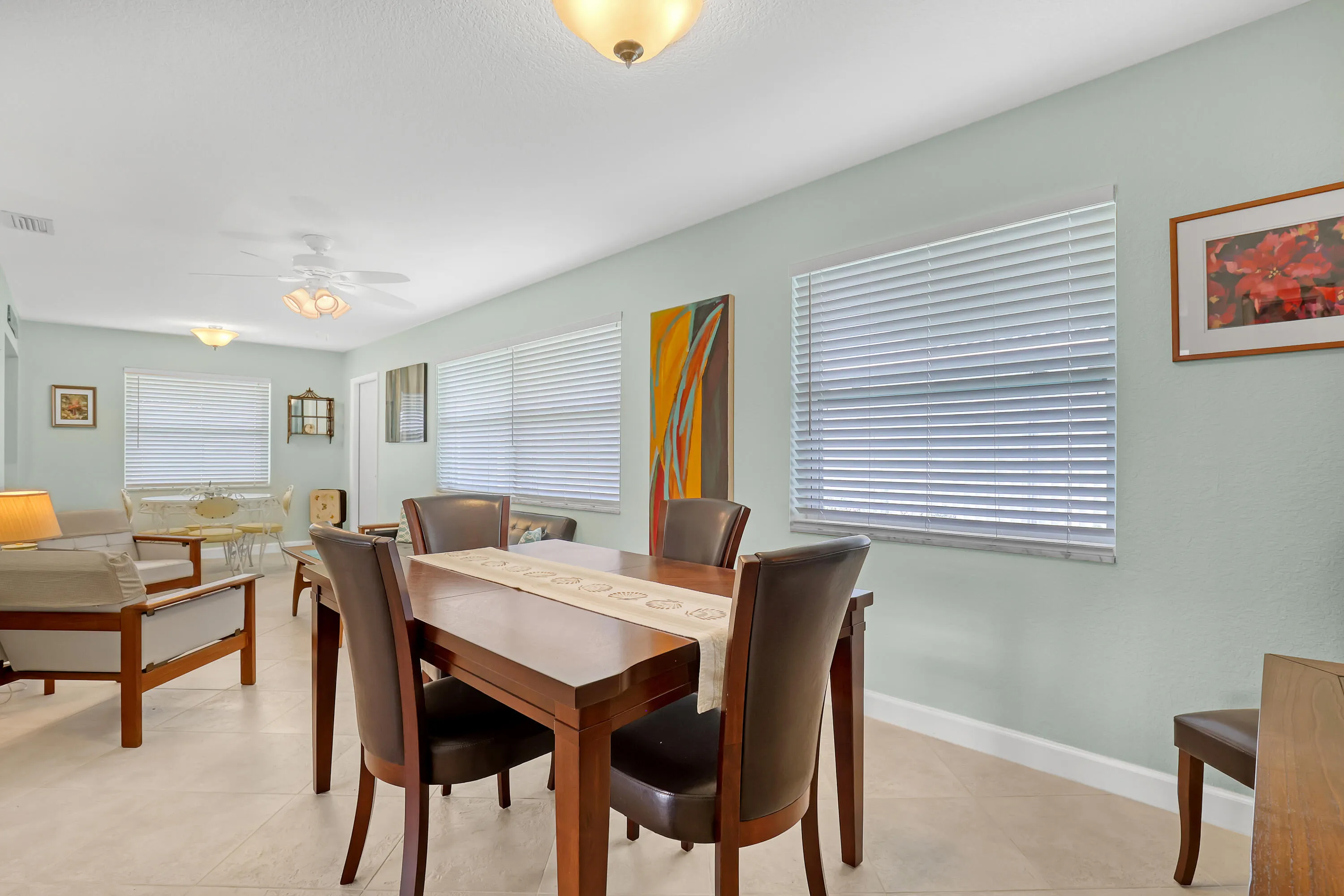 Spacious Florida room for TV viewing, dining or office area.
