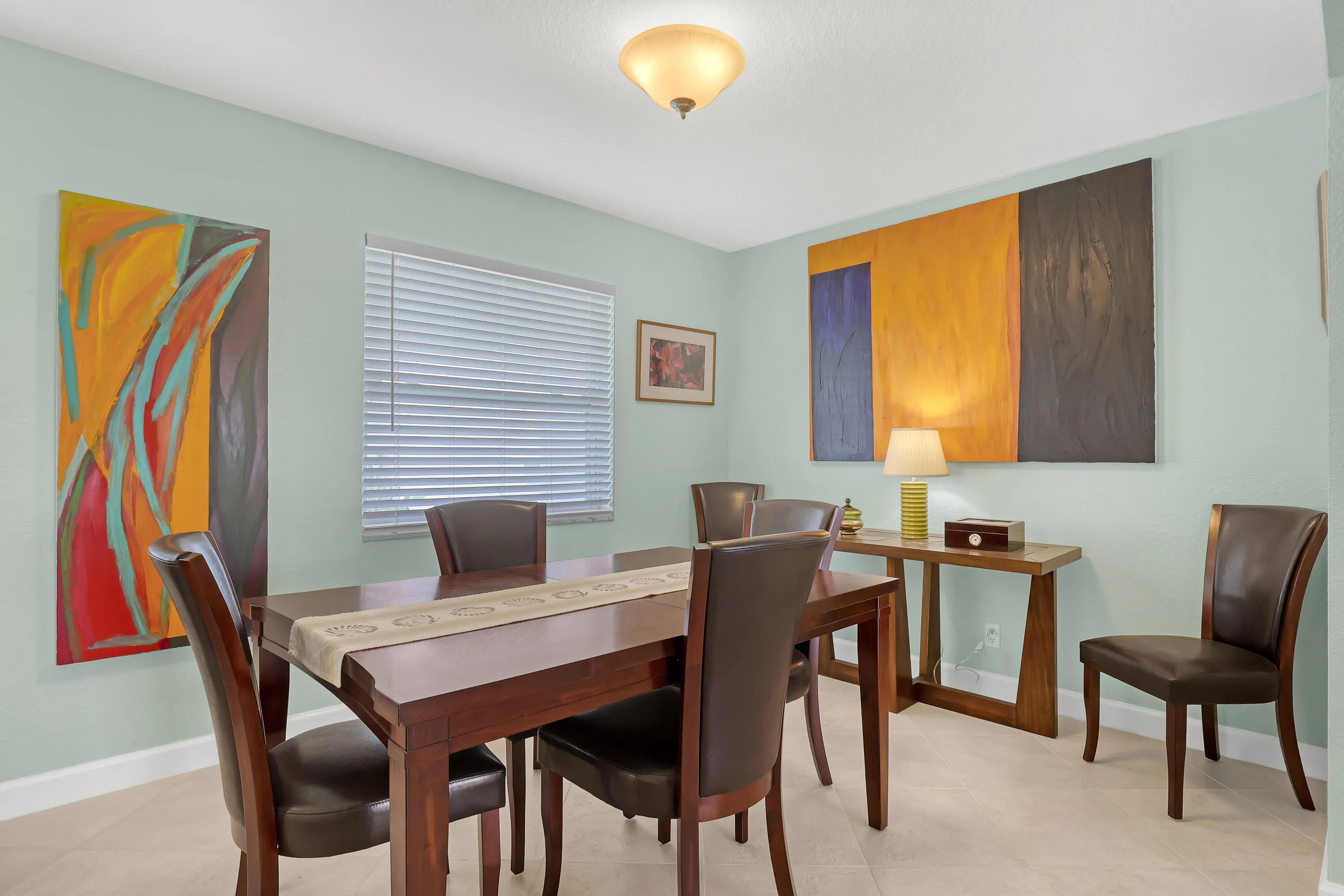 Oversized Dining area in 30 x 10 Florida room area.