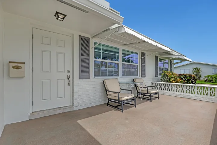 Oversized from porch for entertaining and enjoying Florida sunshine and breezes.