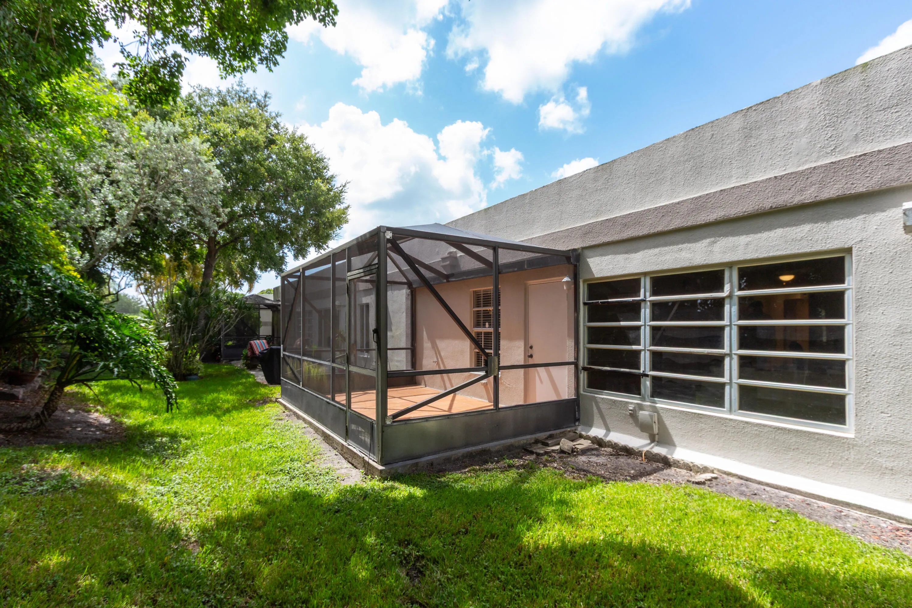 Relax in the screened in back patio with no rear neighbors!