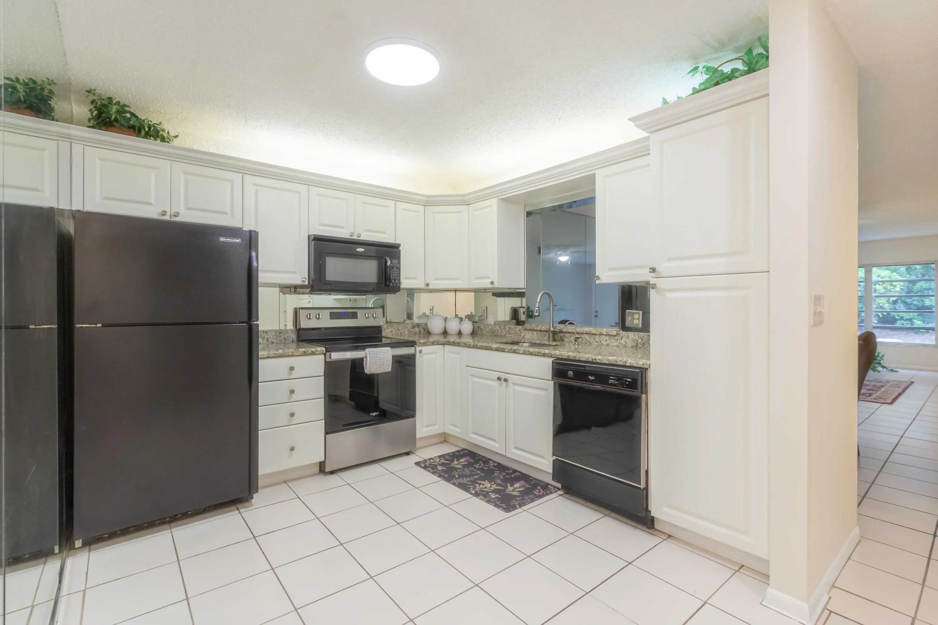 Enjoy the spacious, eat in kitchen with a pass through to the dining room!