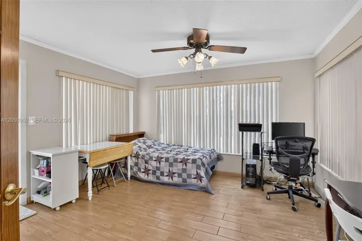 Family room set up as the 4th bedroom