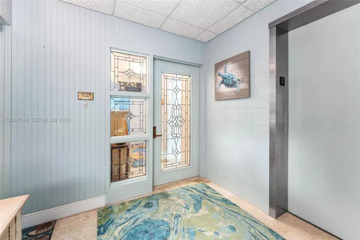 Step off of the elevator into your private entry foyer