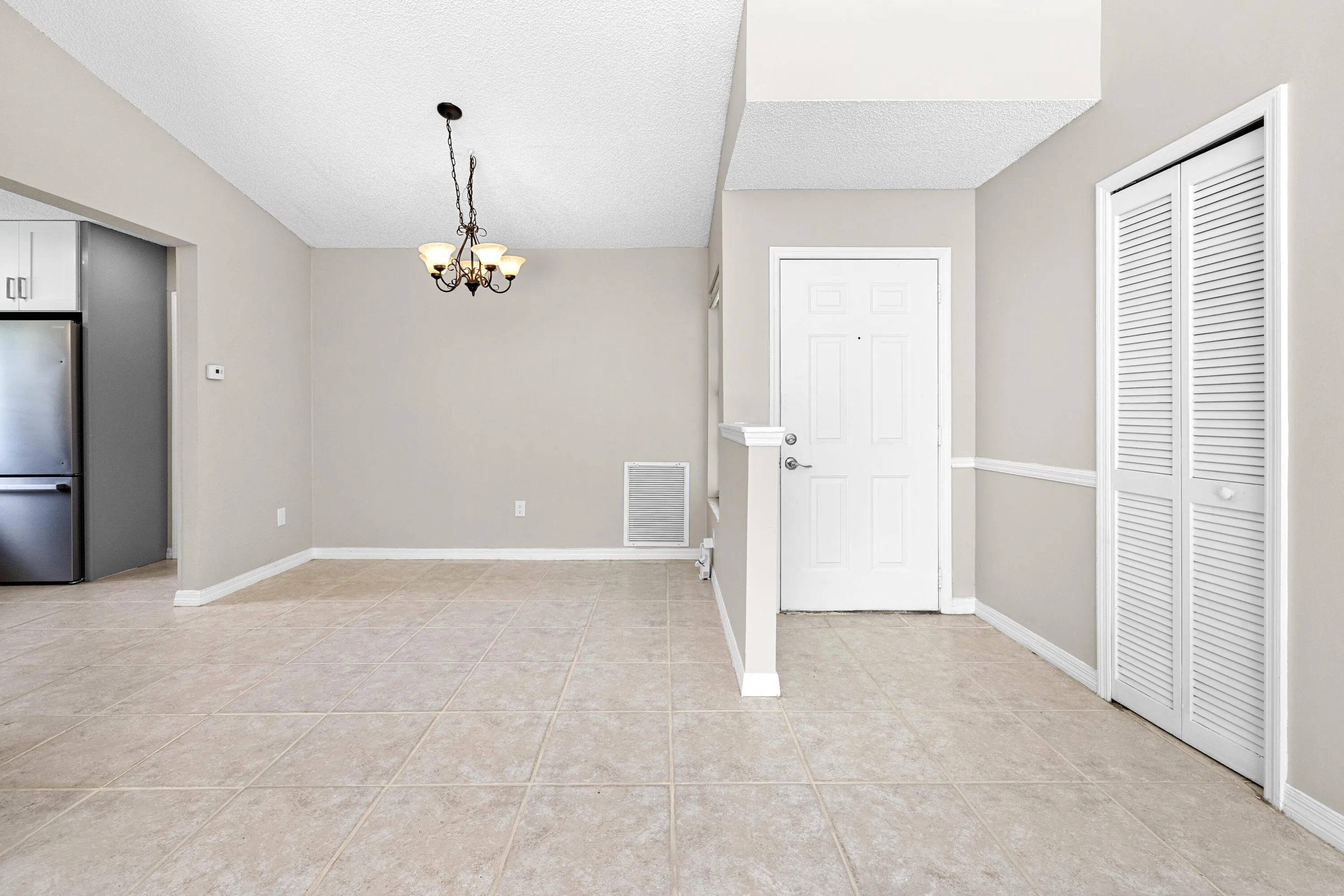 front door and dining room