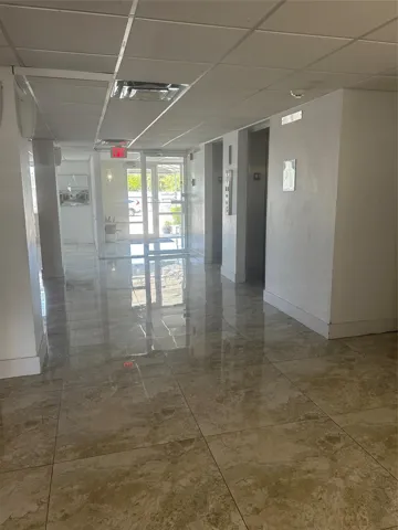 Impact glass doors, marble flooring, two elevators, security enterence, intercom system, face recognition option