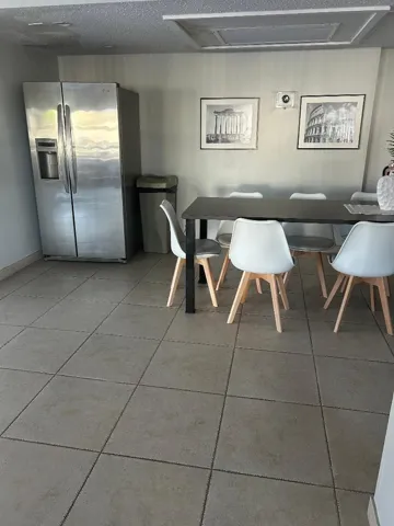 private use of room allowed for occasion: refrigerator, tables n chairs, couches,