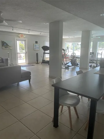 Ceiling fans and lighting, centeral air, security door, couches, tables, chairs, gym equipment, television, radio, pictures, patio area windows view