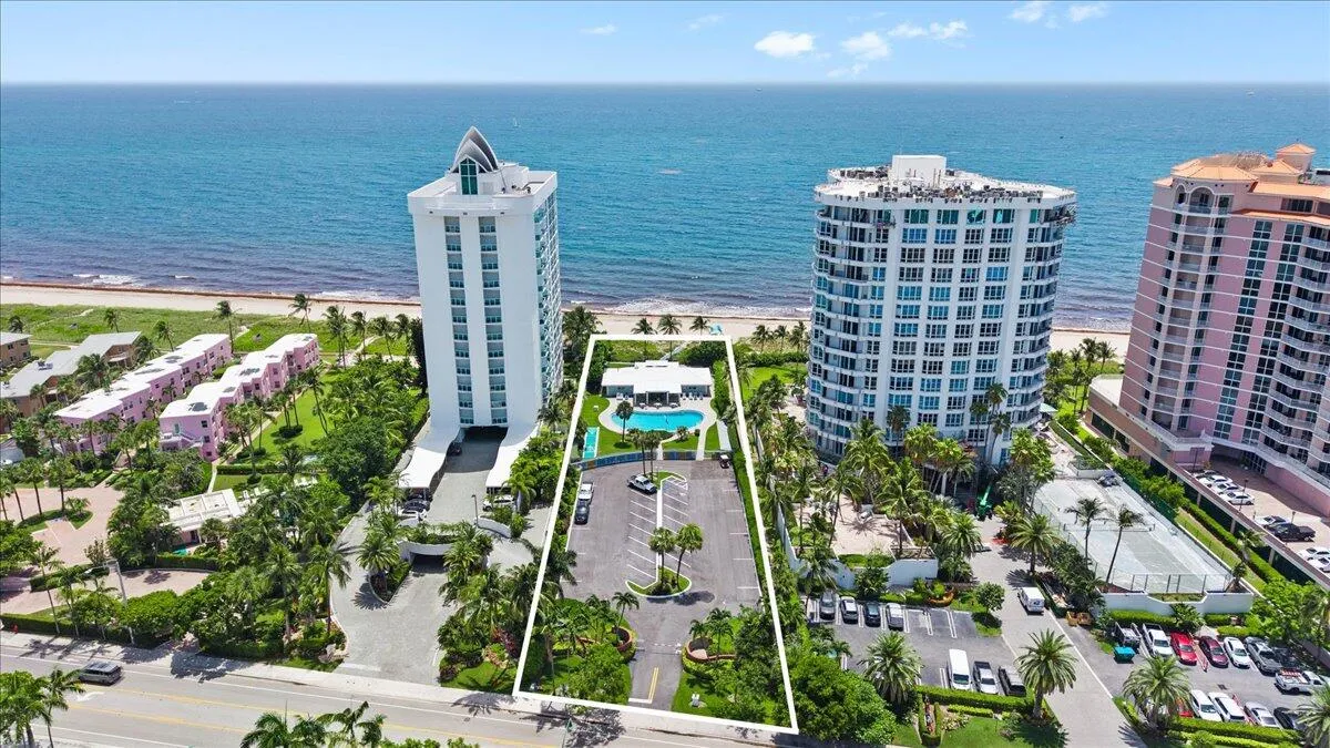 Aerial perspective showcasing a property parcel with direct beach access