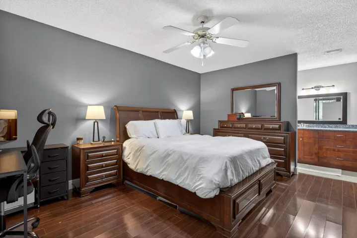 The home has a big primary bedroom with a large walk-in closet, and an ensuite bathroom.