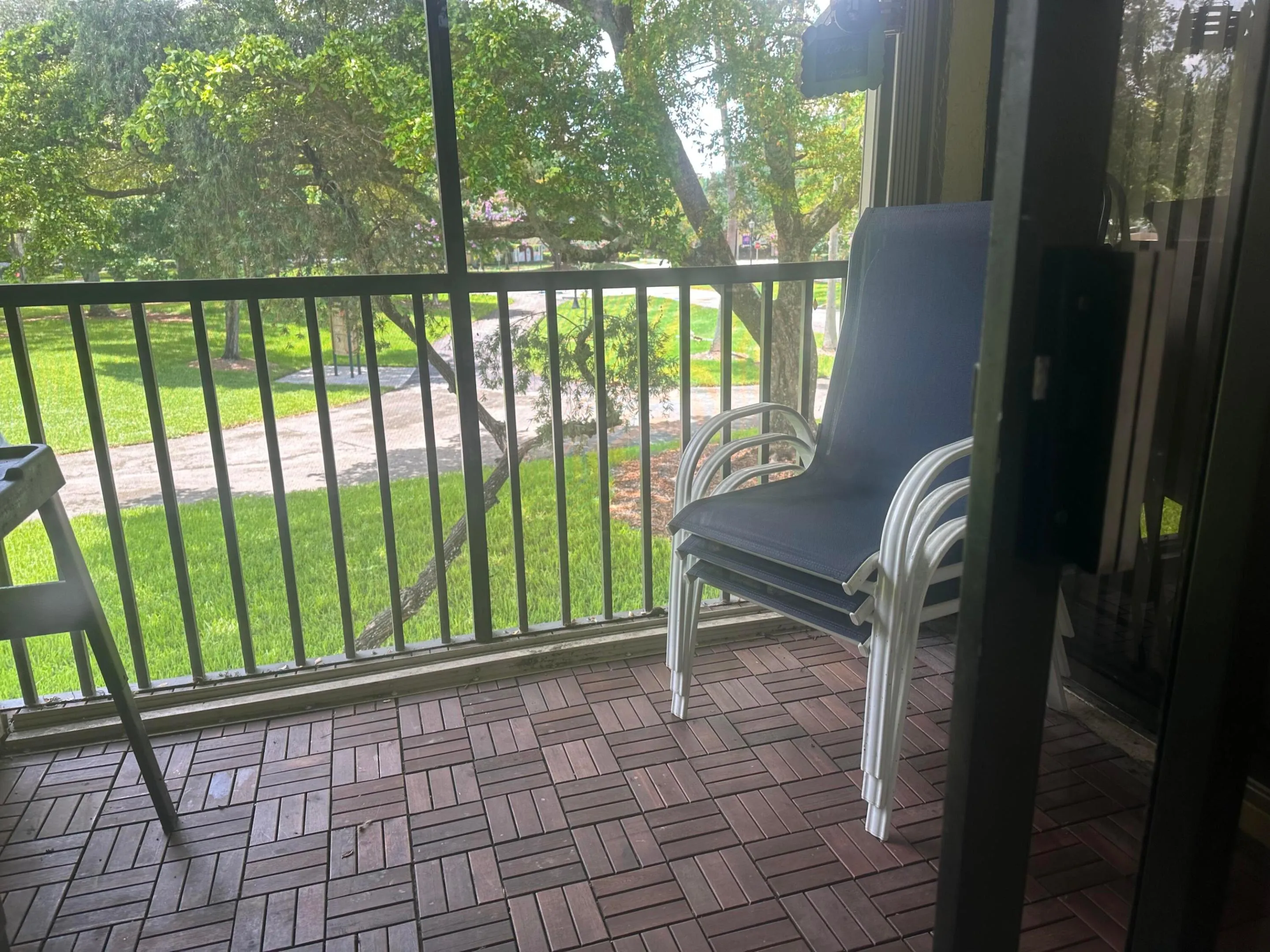 Screened Balcony with Garden View