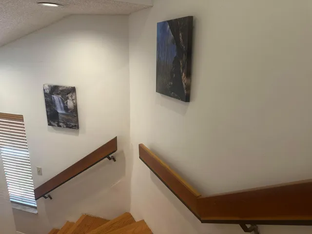 Staircase to primary front door or entrance to 2nd floor