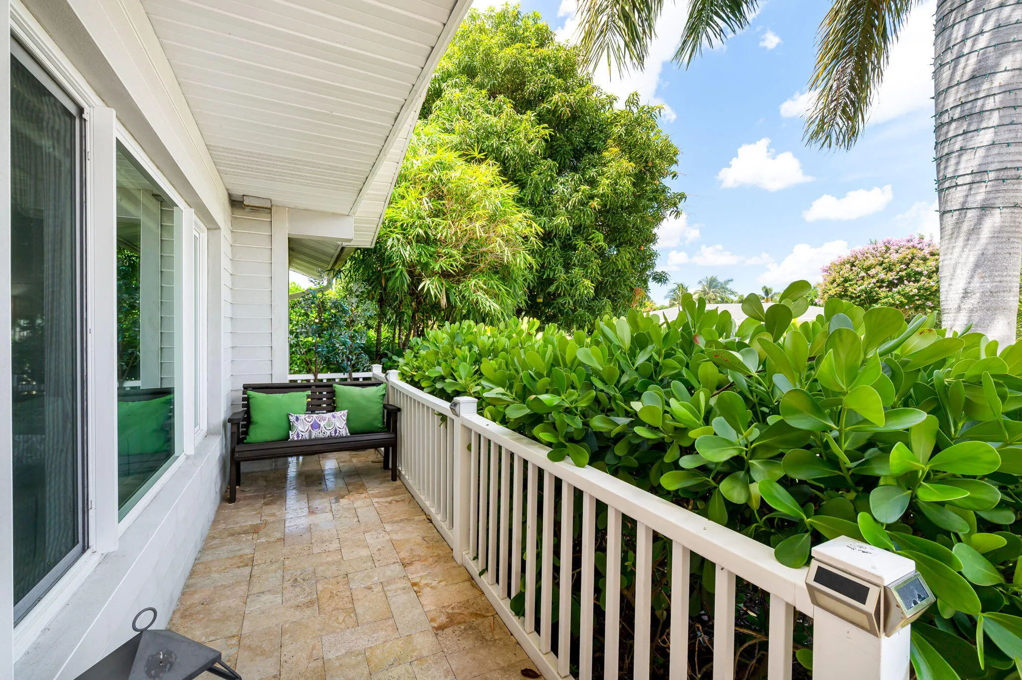 Private front porch where you can wait for Boca Connect to pick you up.