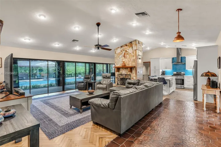 LIVING ROOM WITH WOOD BURNING FIREPLACE