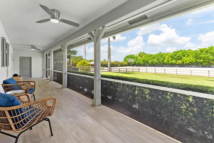 screened porch overlooking property