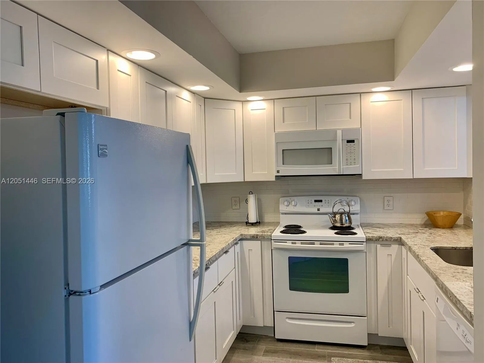 Open and modern with granite countertops