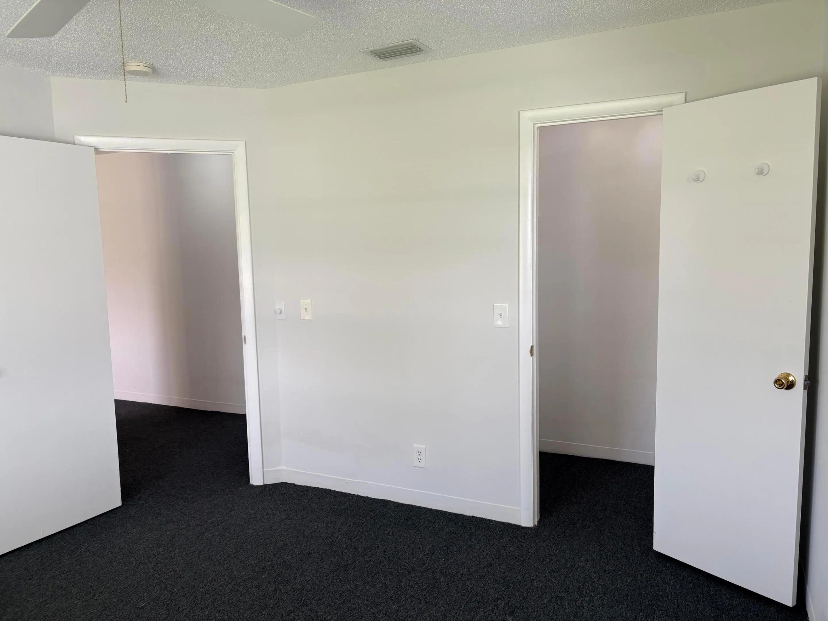 WALK IN CLOSET, DOOR TO HALLWAY AND ANOTHER DOOR TO BATHROOM