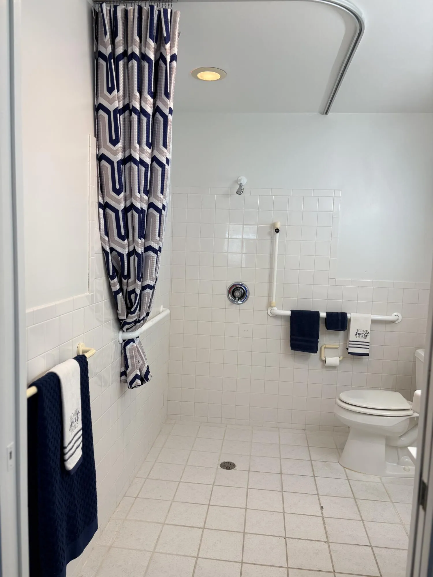 BATHROOM DESIGNED FOR WHEELCHAIR IF NEEDED.