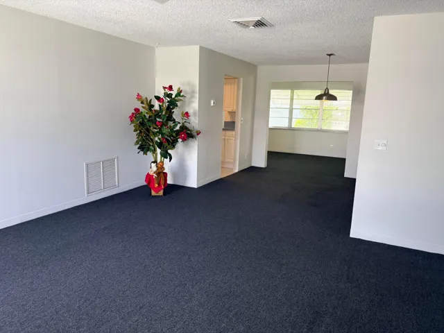 NICE OPEN FLOOR PLAN IN THIS REGIS MODEL HOME.
