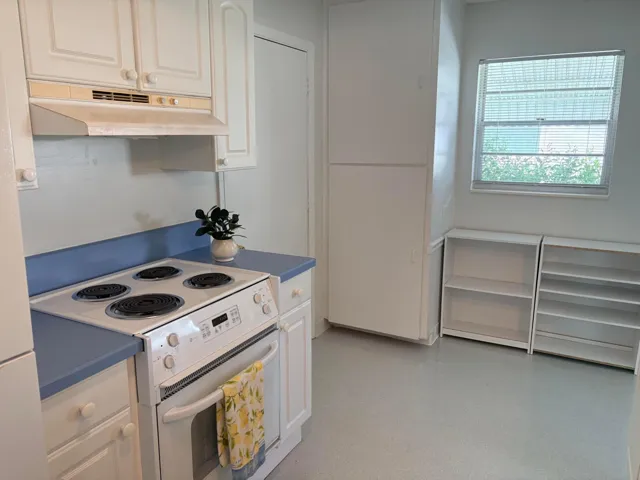 GOOD SIZE BUILT IN PANTRY, GARAGE DOOR OPENS TO THE KITCHEN