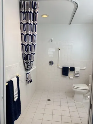 BATHROOM DESIGNED FOR WHEELCHAIR IF NEEDED.