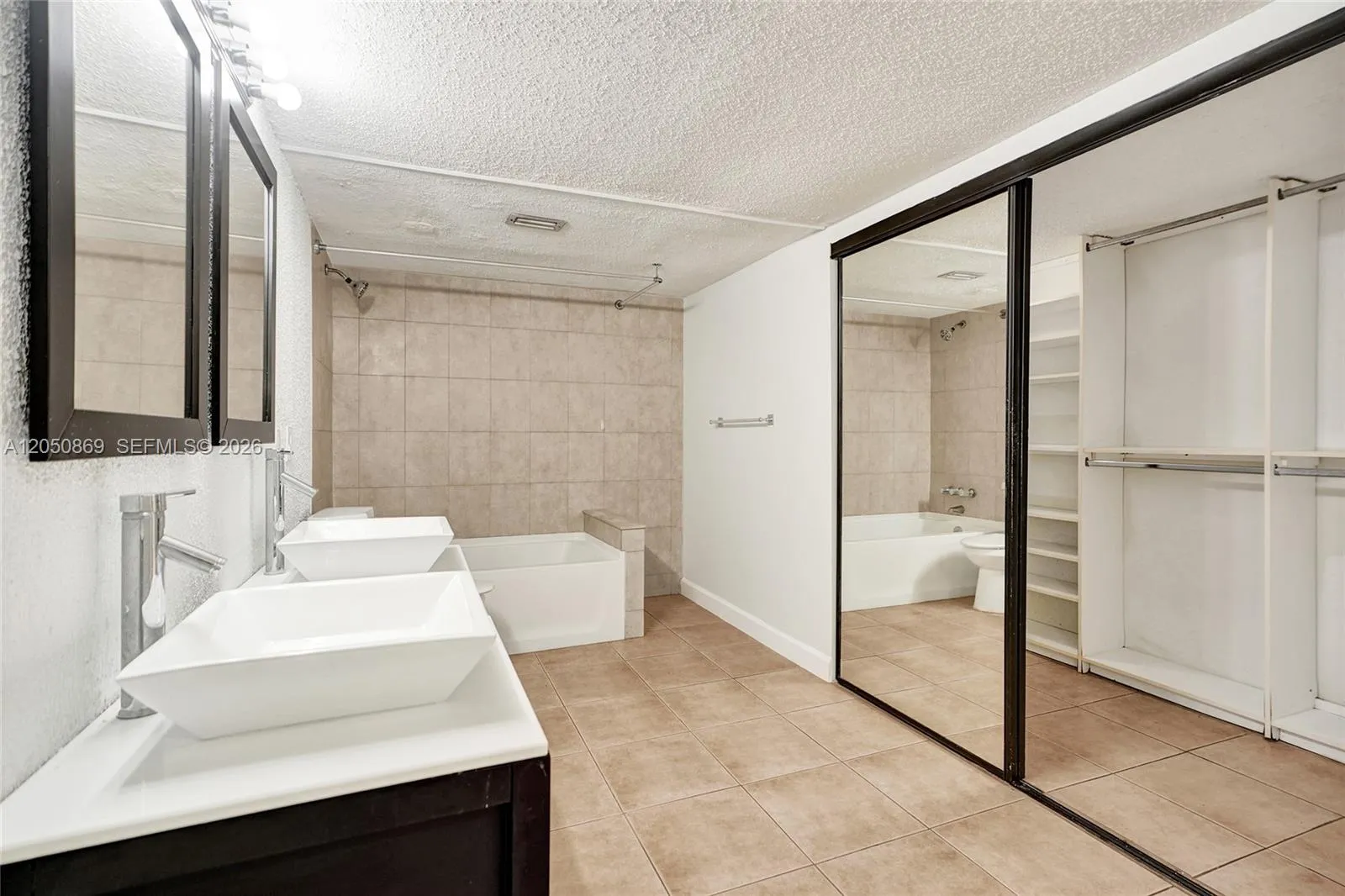 Shows the Walk In Closet!