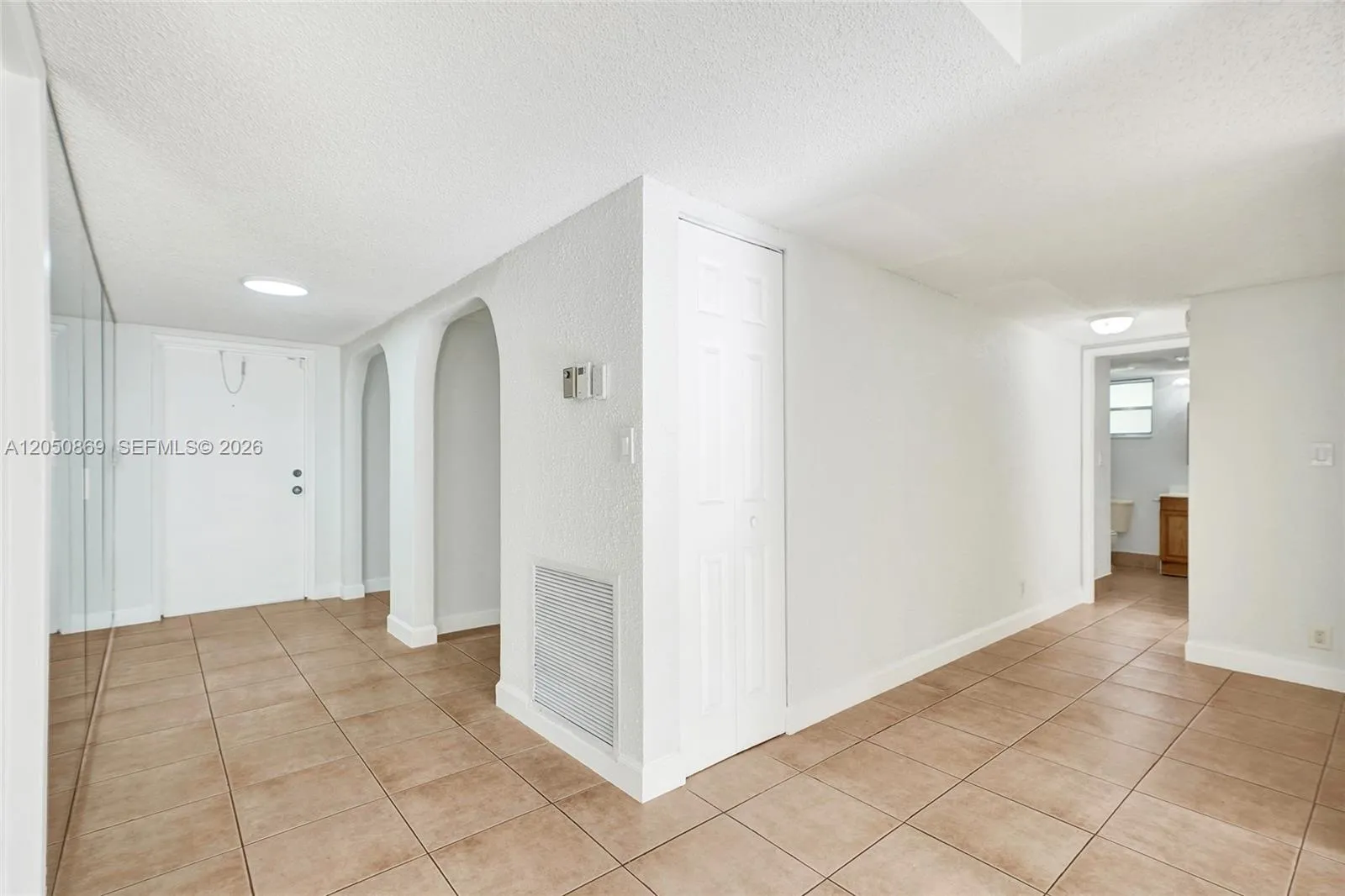 Reverse Entry View and Hall to the Guest Bath!