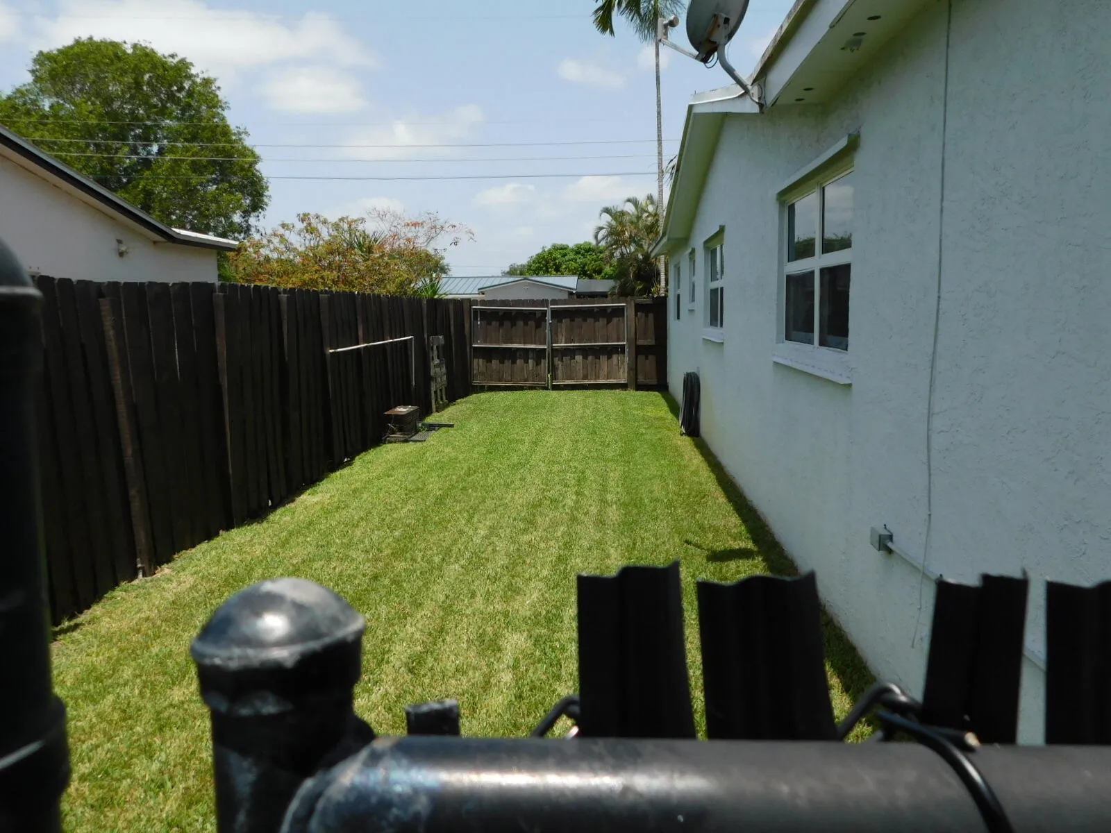 Spacious Side Yard With Gate