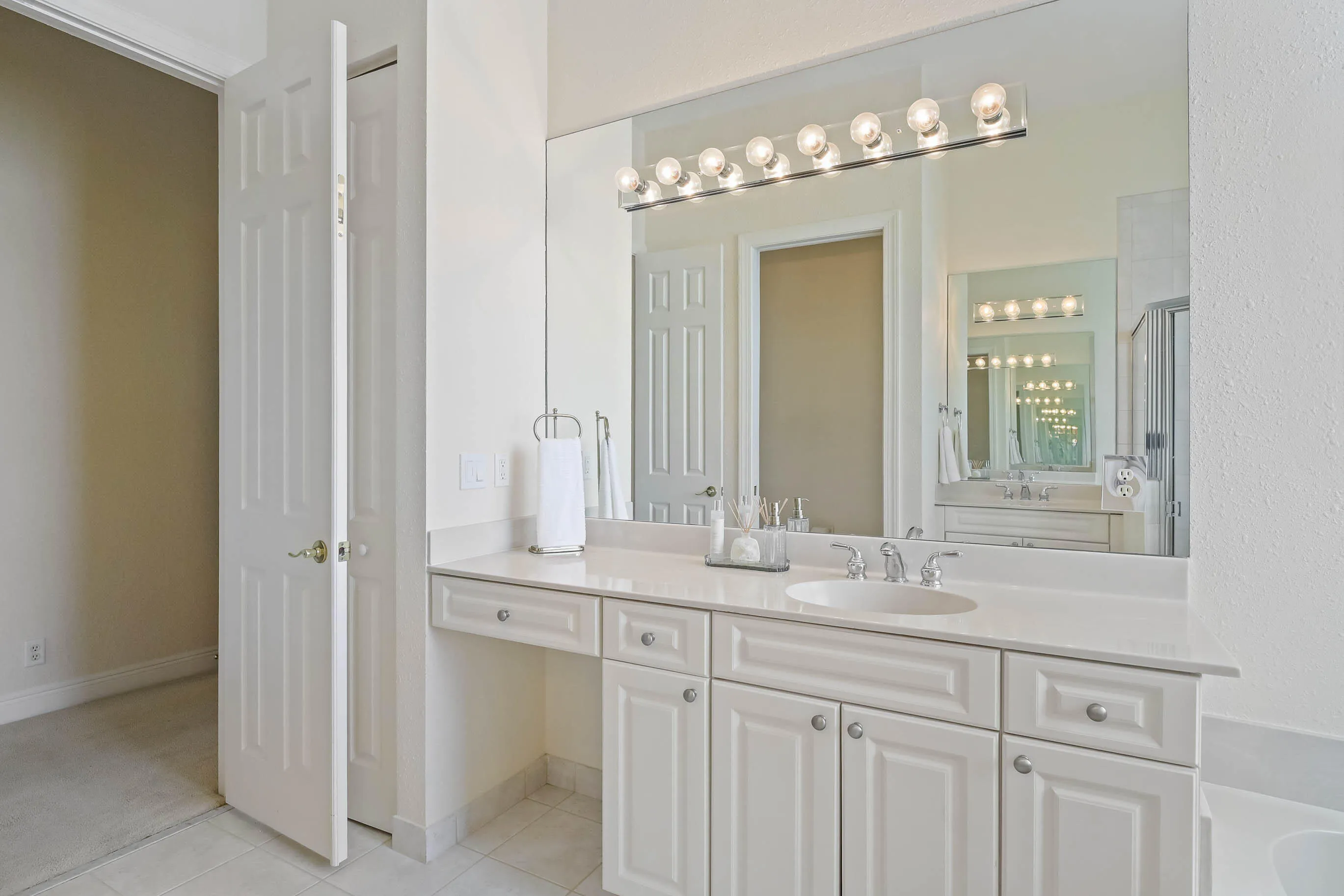 Vanity with an integrated sink, and expansive countertop space