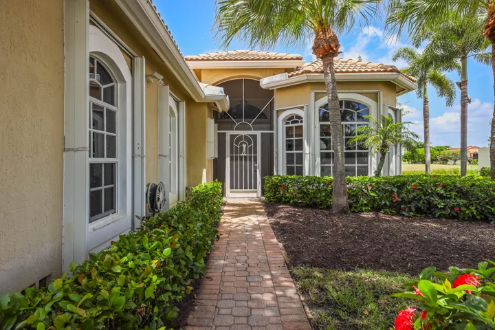 Stucco exterior with a tile roof