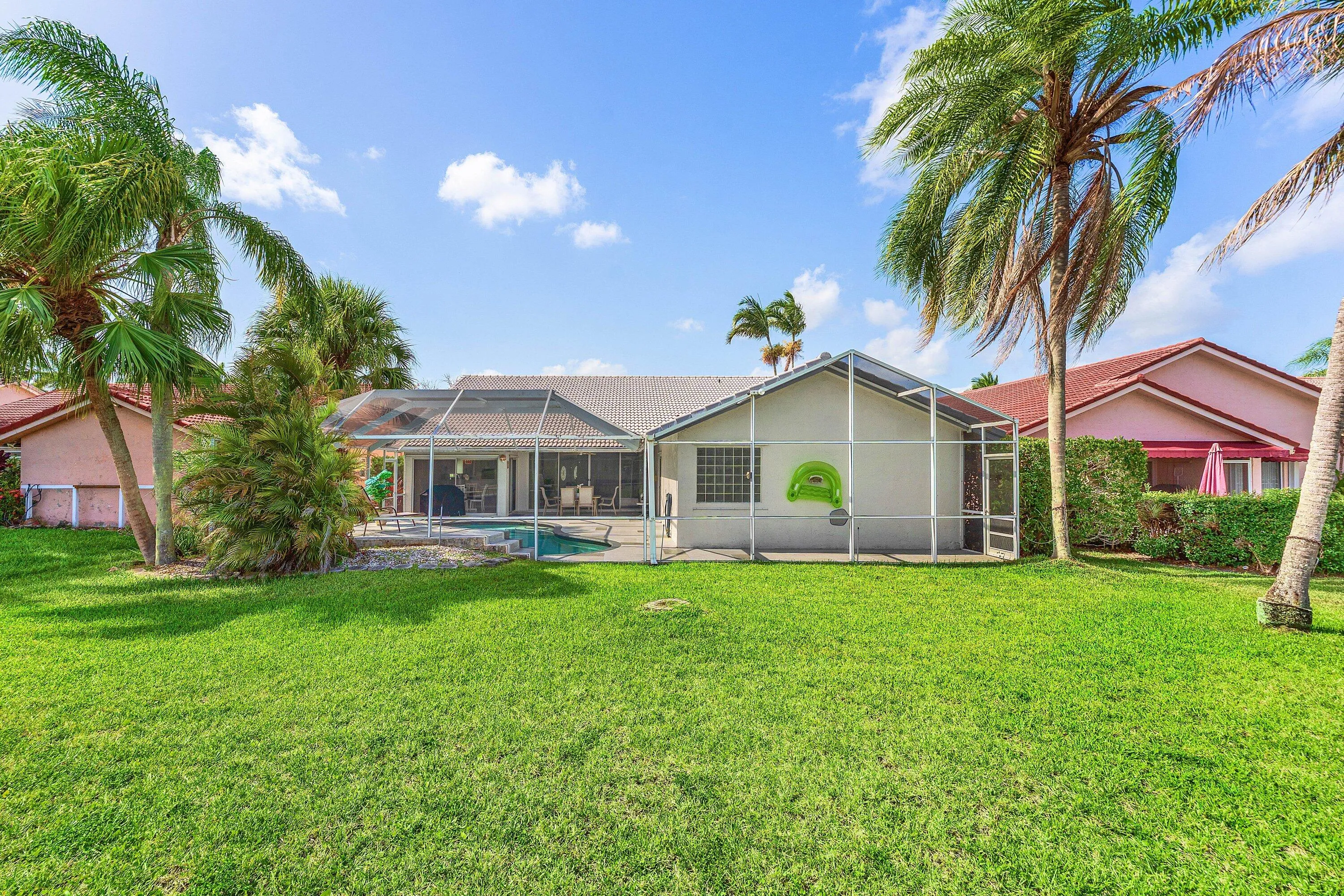 Room to roam behind your tropical oasis!