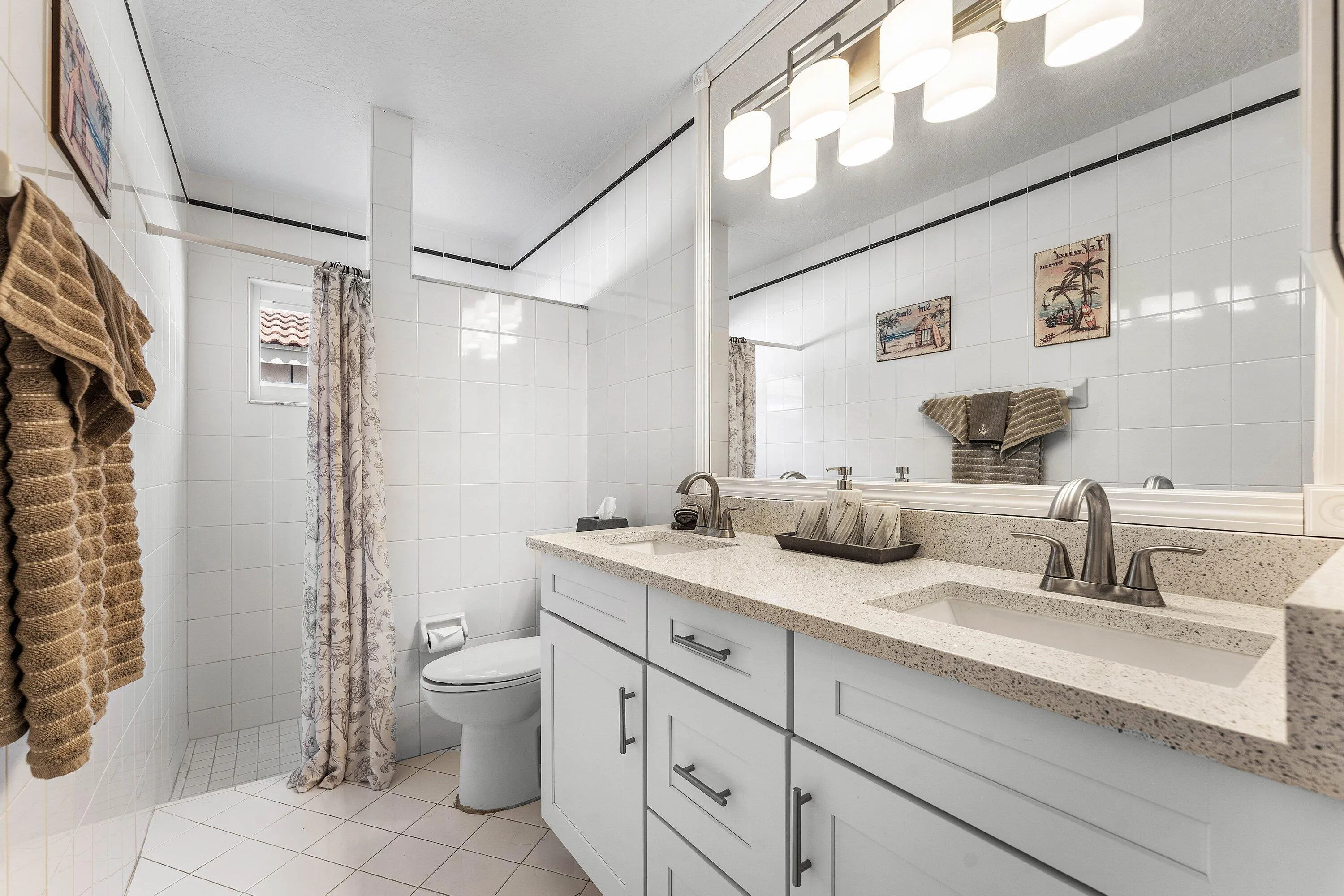 Fabulous double sink bathroom with shower!