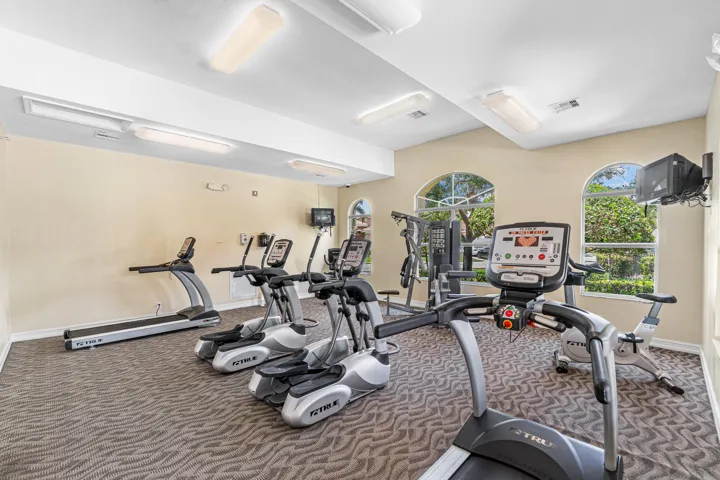 Fitness center with and multiple treadmills and equipment and weights