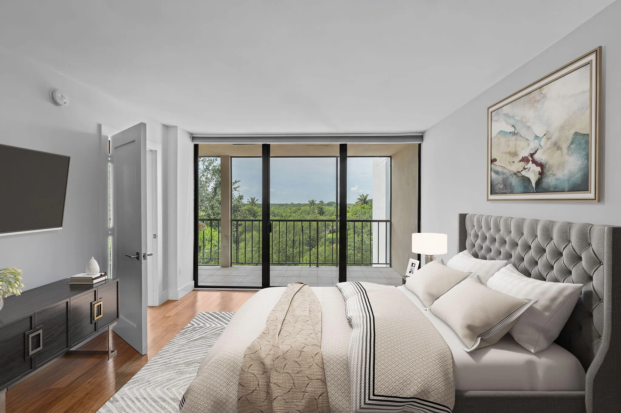 Primary Bedroom with Walk-in Closet. Walk out to patio for your morning coffee. (Virtually Staged)