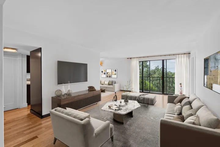 Living Room Re-Imagined. (Virtally Staged) To the left is a storage closet, 2nd Bathroom, and 2nd Bedroom.