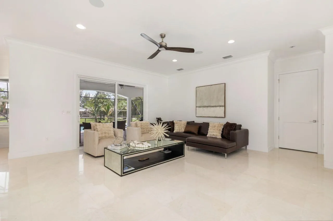 Spacious living area with marble flooring