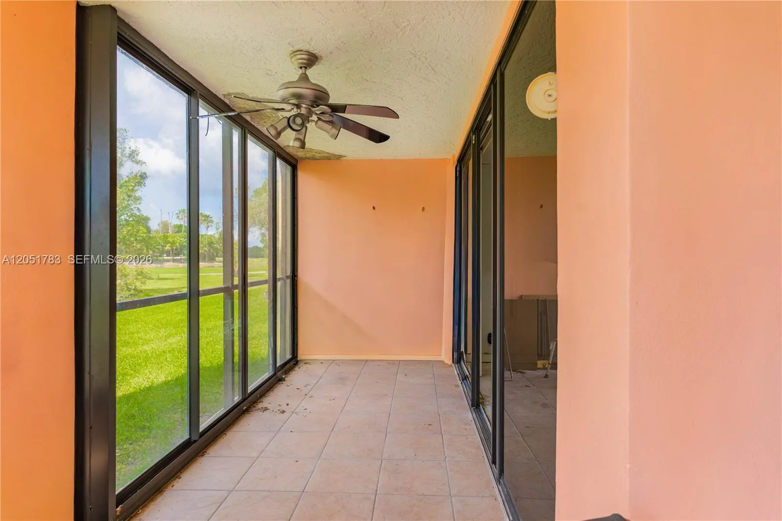 Enclosed patio with impact windows