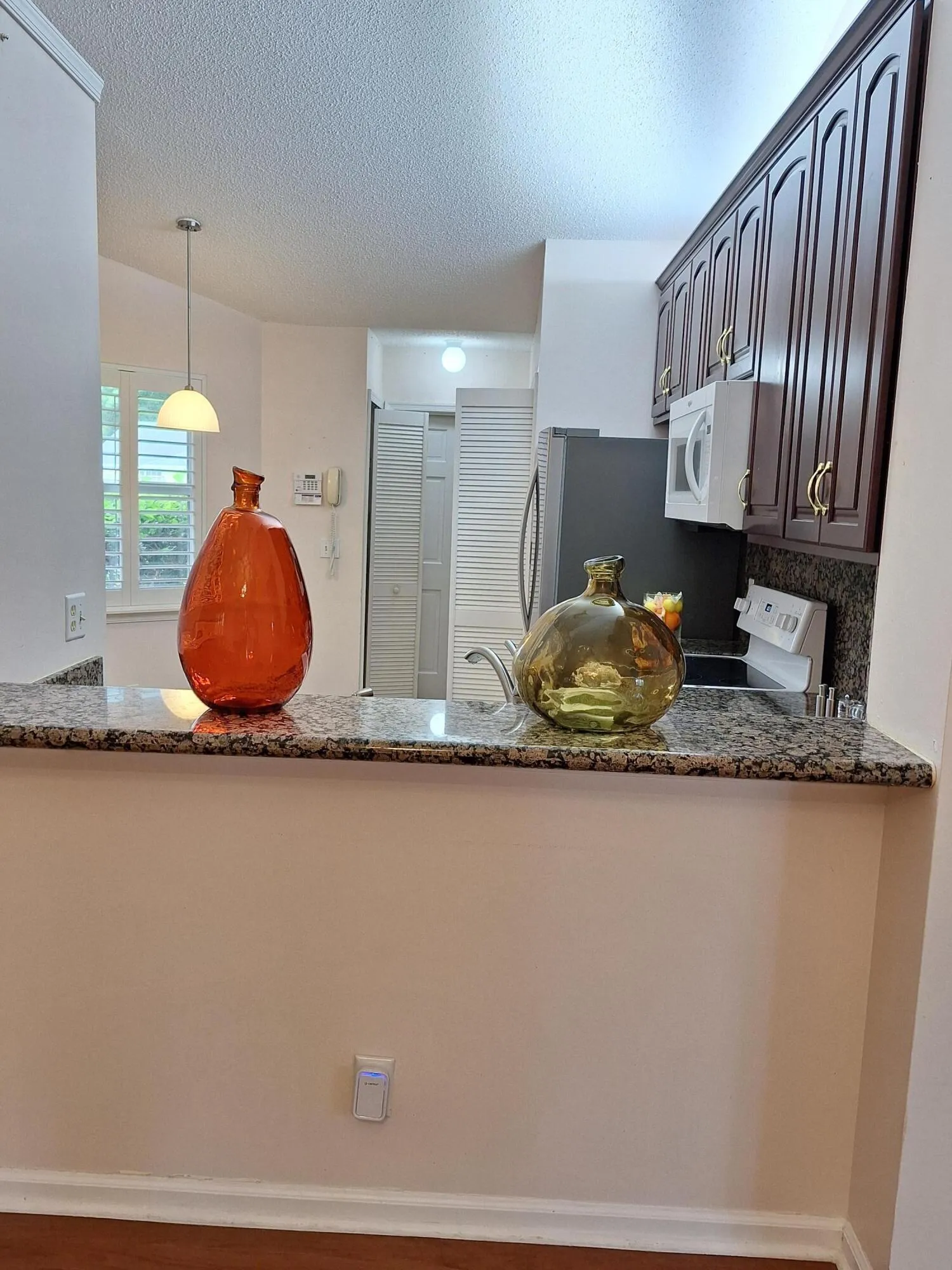 Looking at kitchen from dining area