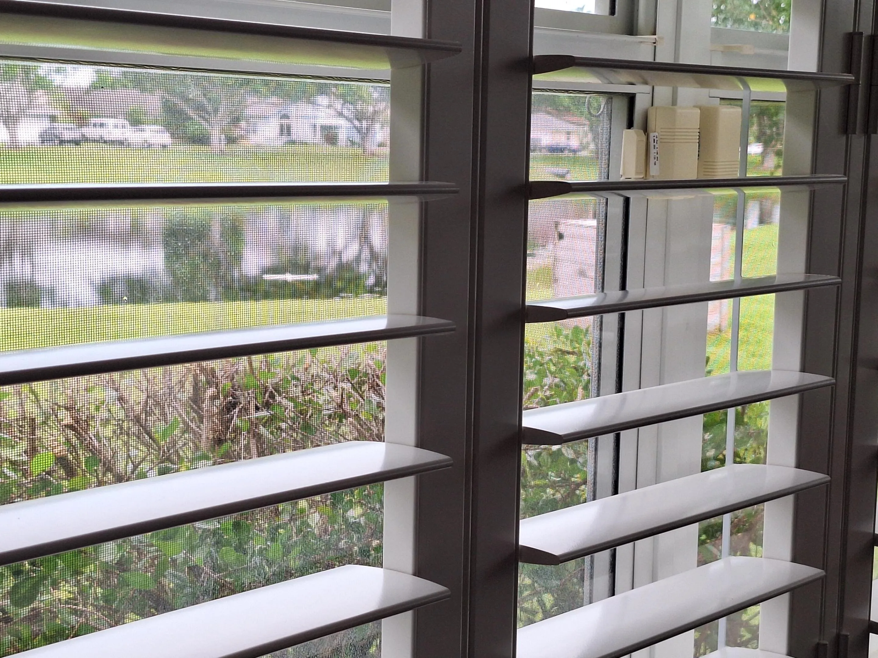 Plantation shutters on all windows--master bedroom also overlooks lake