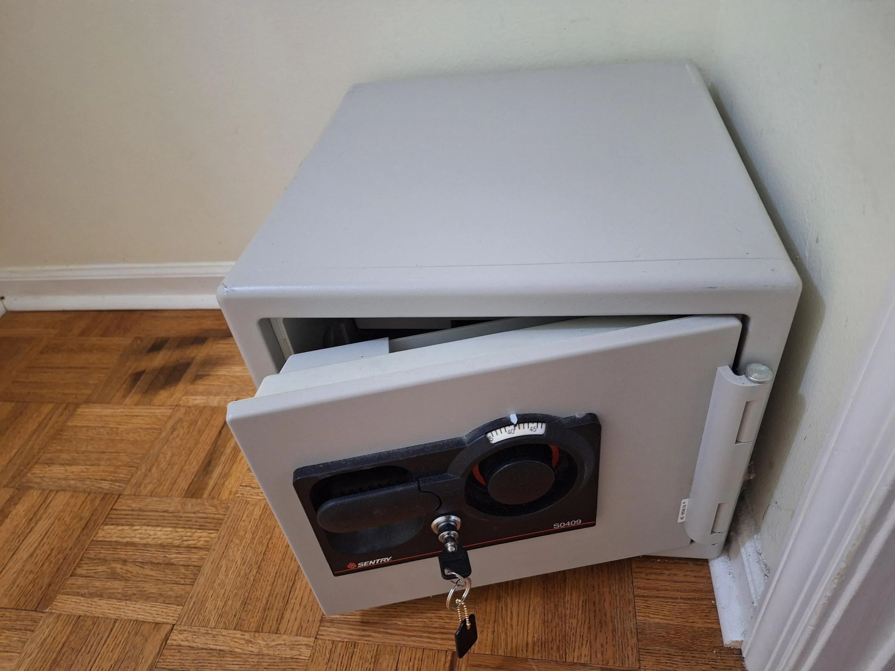Bolted down key safe in master closet