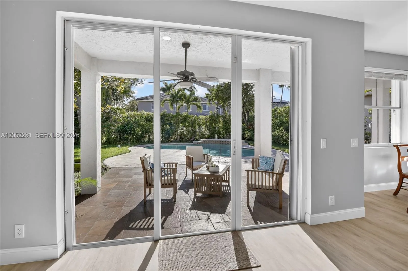 EXIT TO PATIO & POOL