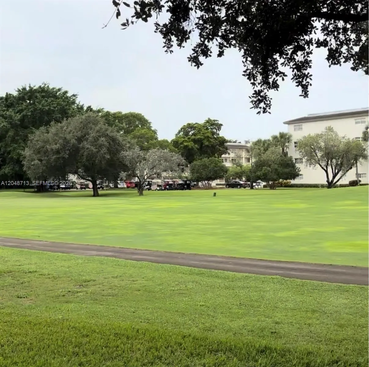 Golf course view behind unit
