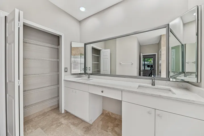 Primary Bath room, double sink with linen closet