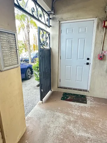 gate next to parking and unit entrance