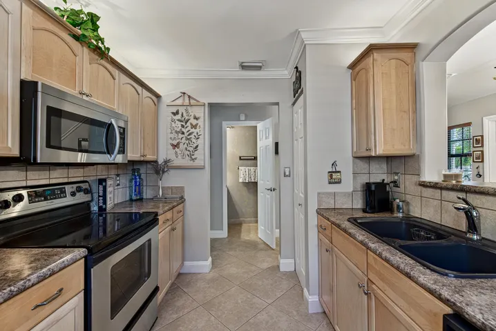 Half Bath in hallway off of kitchen
