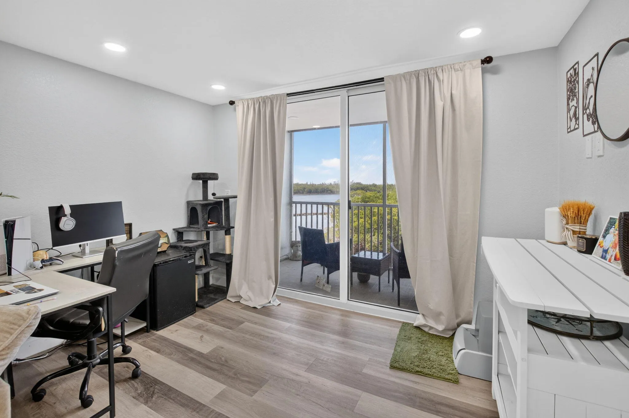 Hurricane Sliding glass doors opening to an exterior balcony