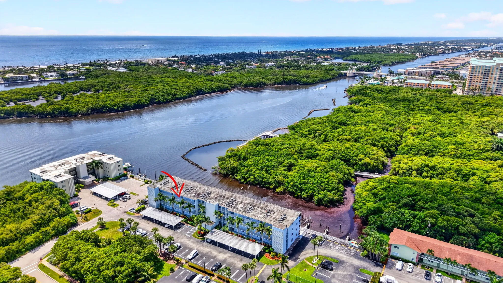 Waterfront condominium building featuring direct water access