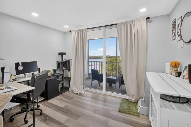 Hurricane Sliding glass doors opening to an exterior balcony