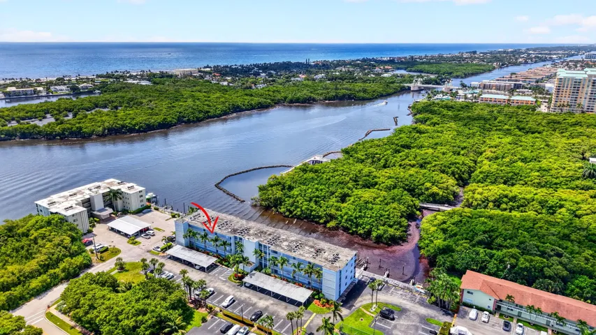 Waterfront condominium building featuring direct water access