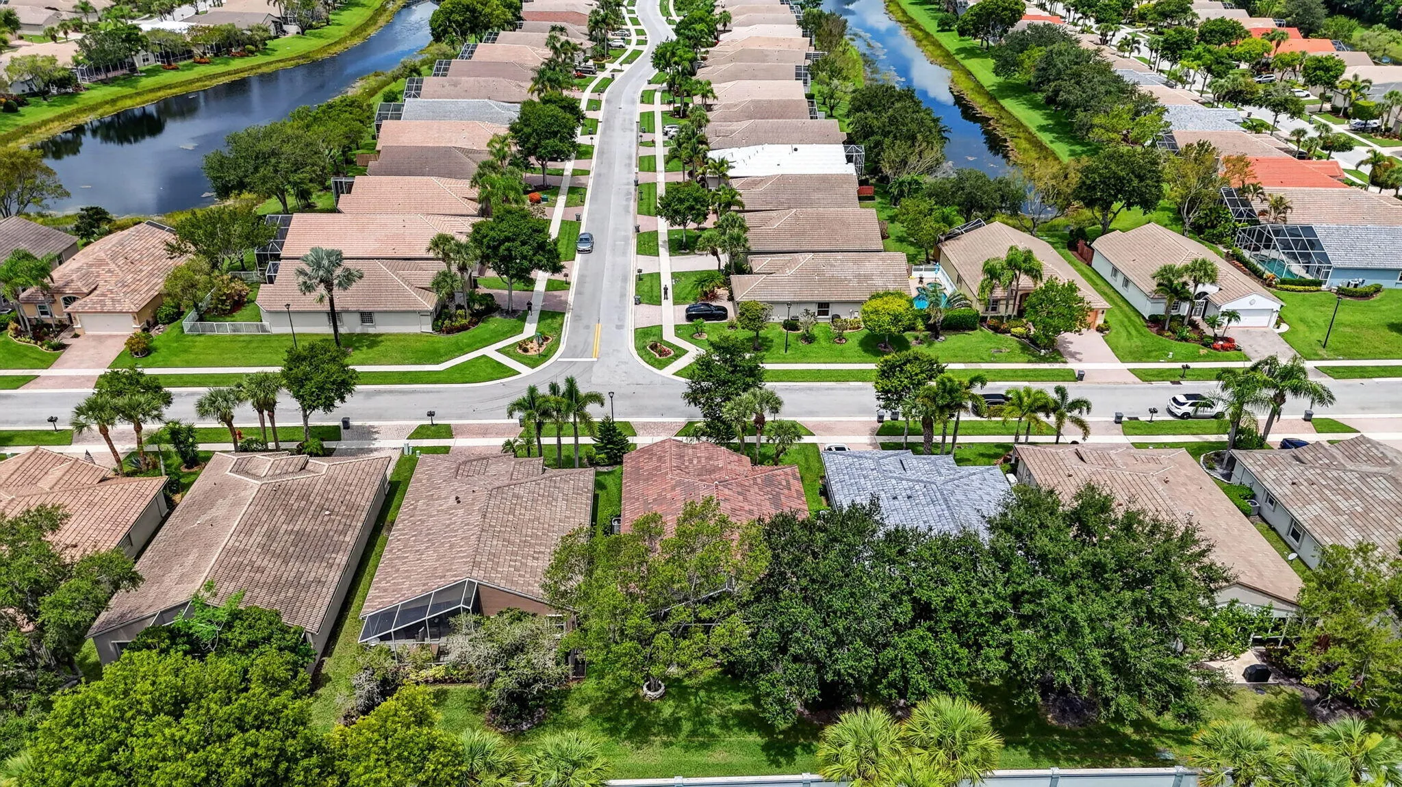 Aerial perspective showcasing a residential community with uniform home styles