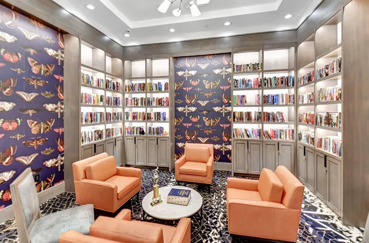 Custom built-in library shelving with integrated lighting